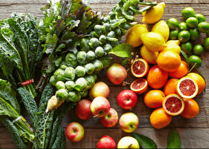 a group of fruits and vegetables on a wood surface Healthy Weight Loss Diets Shefford